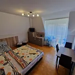 Napsugar Apartmanhaz Couette-café