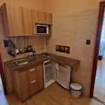 Napsugar Apartmanhaz Couette-café